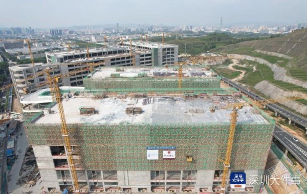 长红配资 提前30天, 深圳首个成功落地的公路物流枢纽封顶